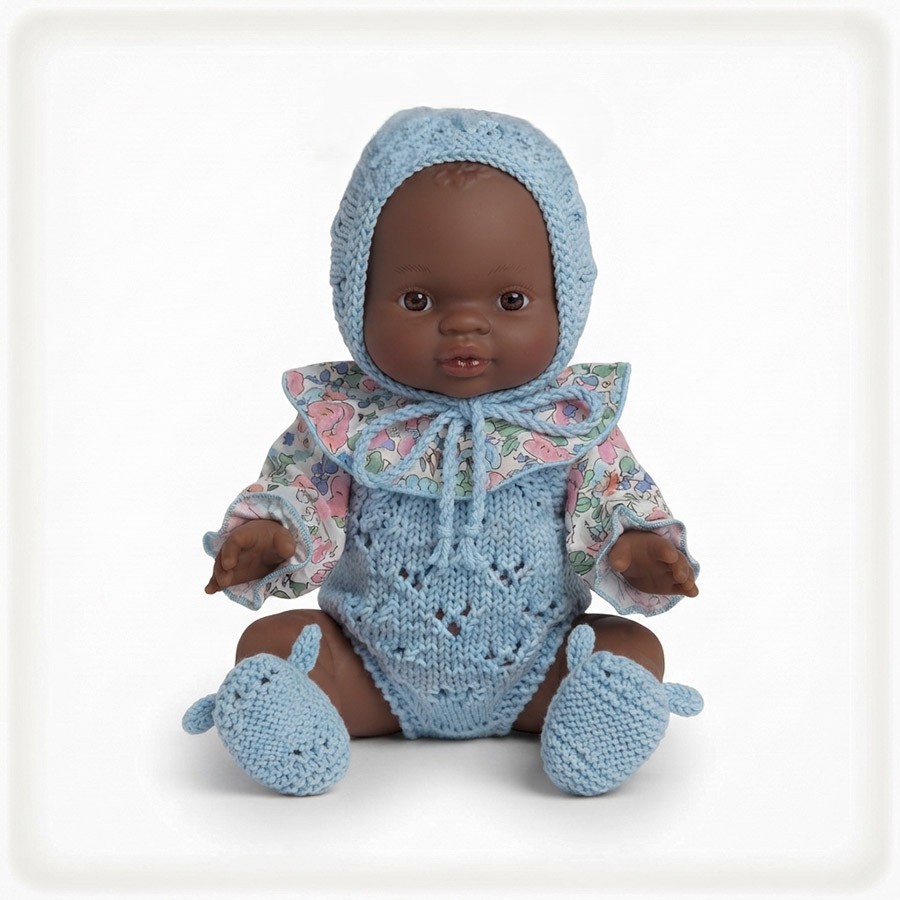 Muñeca N. peto azul flores